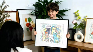 AI art frame for autistic children: A child proudly displays their colorful cat drawing, framed in a sleek AI art frame that celebrates neurodiverse creativity, self-expression, and childhood art.