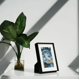 Kokonna 7.3 inch wireless E-ink art frame in aerospace aluminum front view displaying colorful AI generated abstract art
