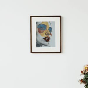 Side profile of Kokonna Spectra 6 E-ink digital frame showing solid black walnut body and cordless wall mount design